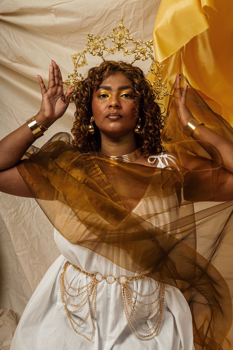 Stylish Woman in Goddess Costume with Gold Crown